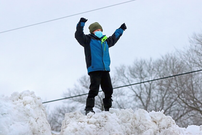 011821.N.BD.SnowpileKid1.jpg