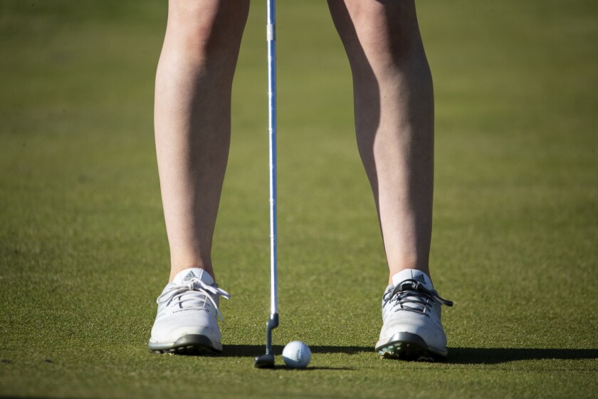 Sydney Gustafson of the Community Christian School hosts during a Camden Conference boys and girls golf meet at the Valley Golf Course on Thursday, May 5, 2022 in Willmar.
