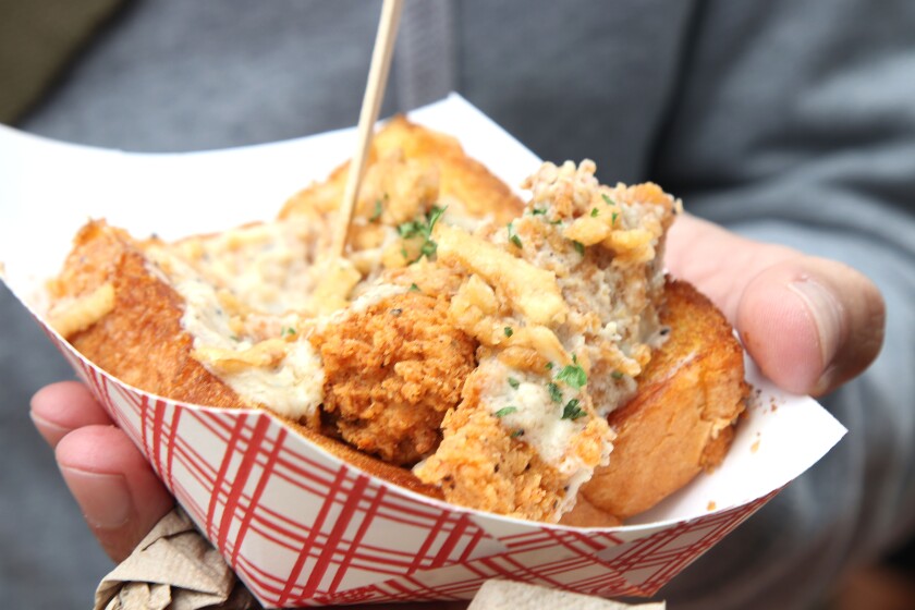 Vegan 'fried chicken' served in a paper bowl.