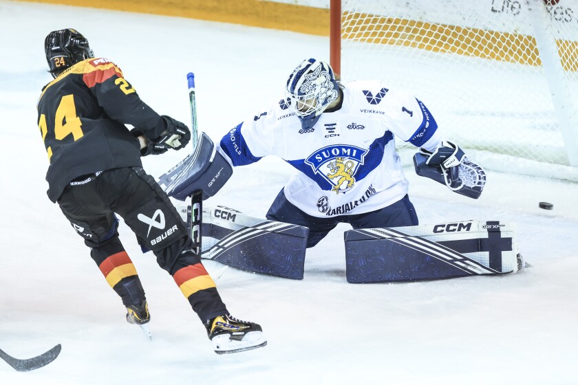 men play ice hockey