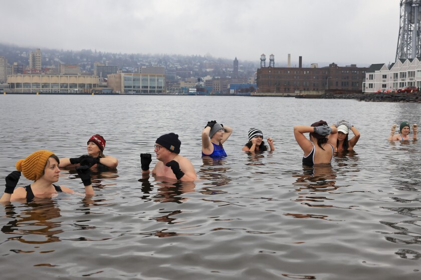 people swim in cold water in December