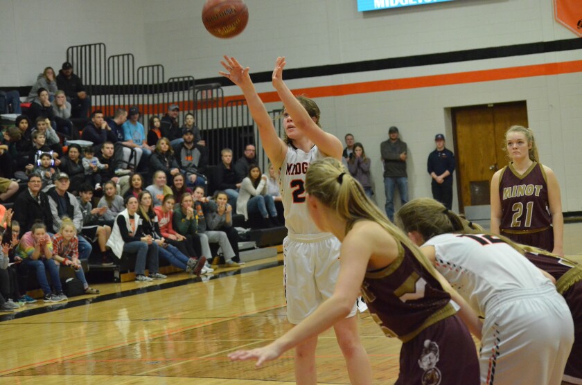 DHS sophomore forward Audrey Rodakowski fires the game-winning free throw against Minot on Friday, Jan. 26 from the DHS Gym. (Patrick Bernadeau/The Dickinson Press)