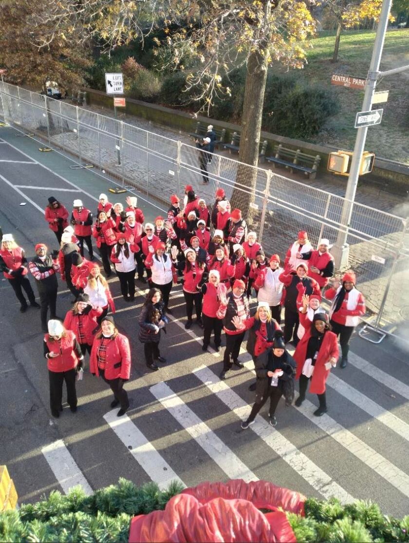 A group of Macy's employees stand in the street in New York City