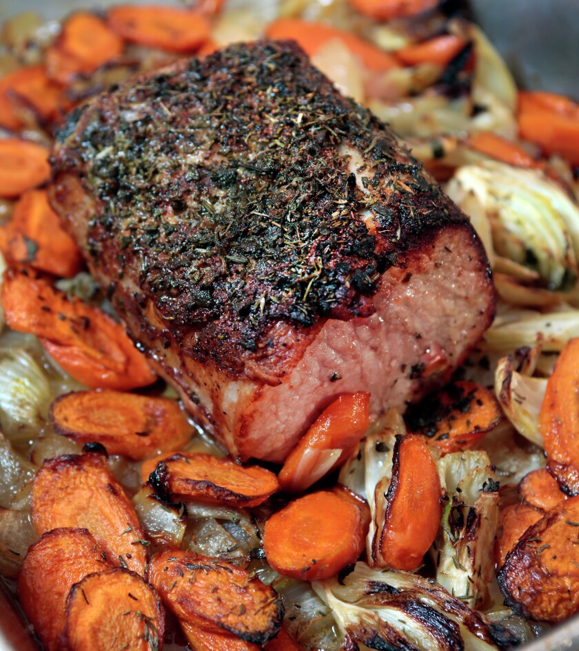 Herb roast pork tenderloin with seasonal vegetables prepared by Tony Nasello.Dave Wallis / The Forum