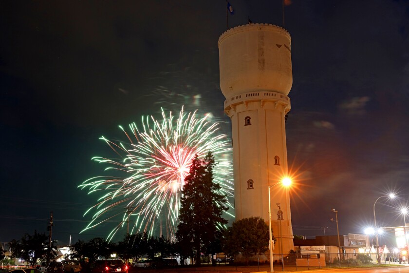Fireworks light up the sky for the Fourth of July on Monday, July 4, 2022, beyond the historic water tower in Brainerd.