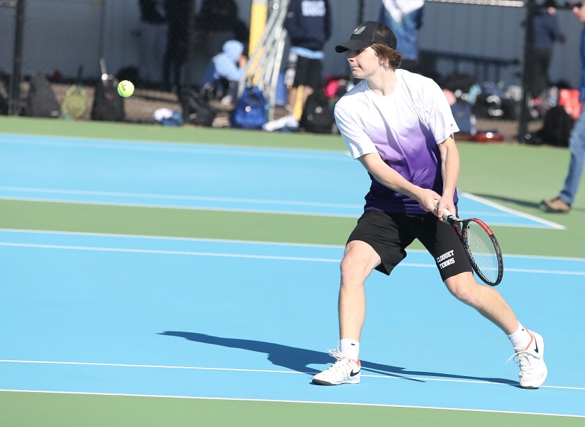 Cloquet's Tyler Leppi returns a shot