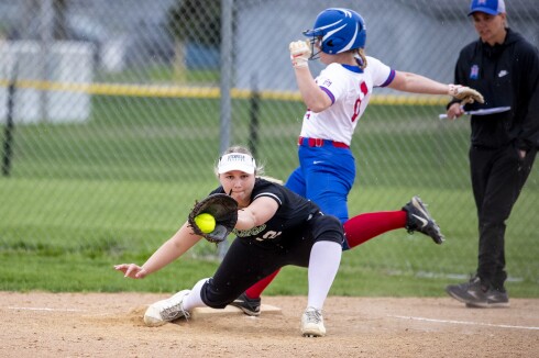Litchfield first baseman Isabelle Pennertz catches the ball at first base as Macey Hess of Watertown-Mayer crosses the bag Tuesday, May 17, 2022, in Litchfield.