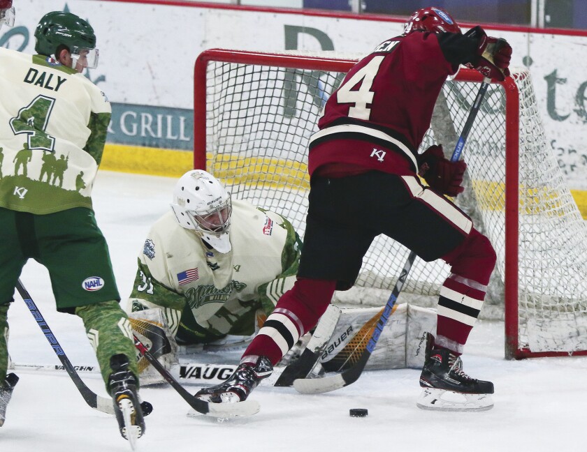 Minnesota Wilderness goaltender Jacob Sibell makes one of his 36 saves during Friday's night's 2-0 shutout win over Minot at Northwoods Arena. Dave Harwig / Pine Journal