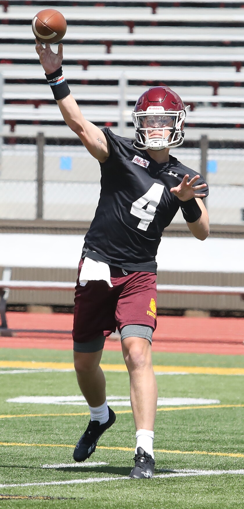 Bulldog quarterback Logan Graetz (4) completes a pass