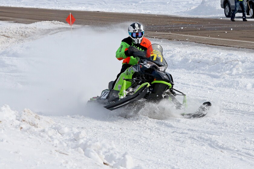 Snowmobilers race