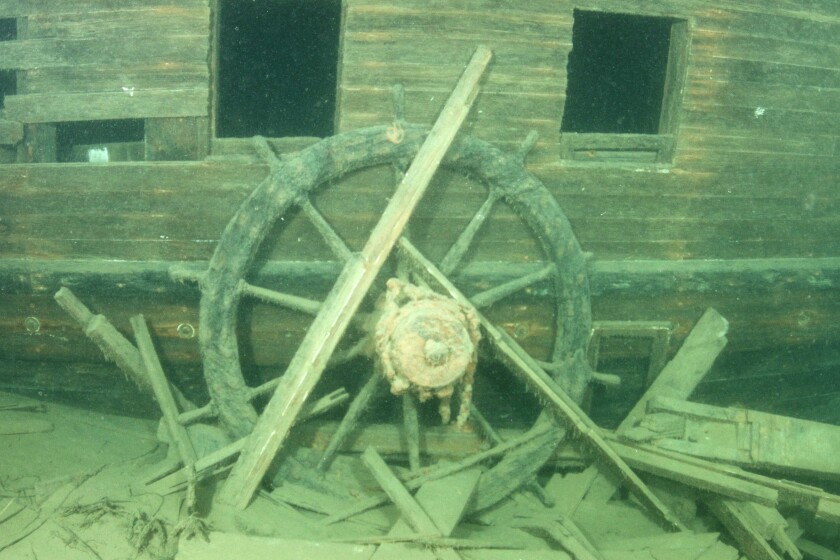 WRECK1103c6 -- The wheel of the J.S. Seaverns rests on the starboard side of the ship, amid what may be the remains of the pilothouse, where the ship sank in 1884 on Lake Superior near Michipicoten Harbor, Ontario. The wreck was discovered in July 2016. (Photo by Nick Lintgen)