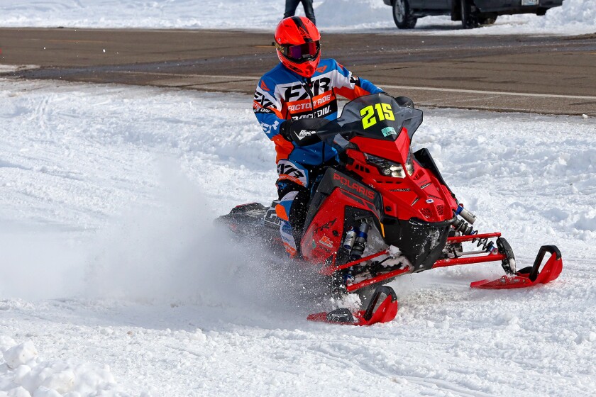Snowmobilers race