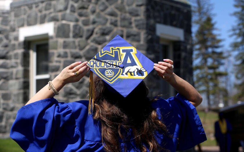 Graduate shows off her mortarboard
