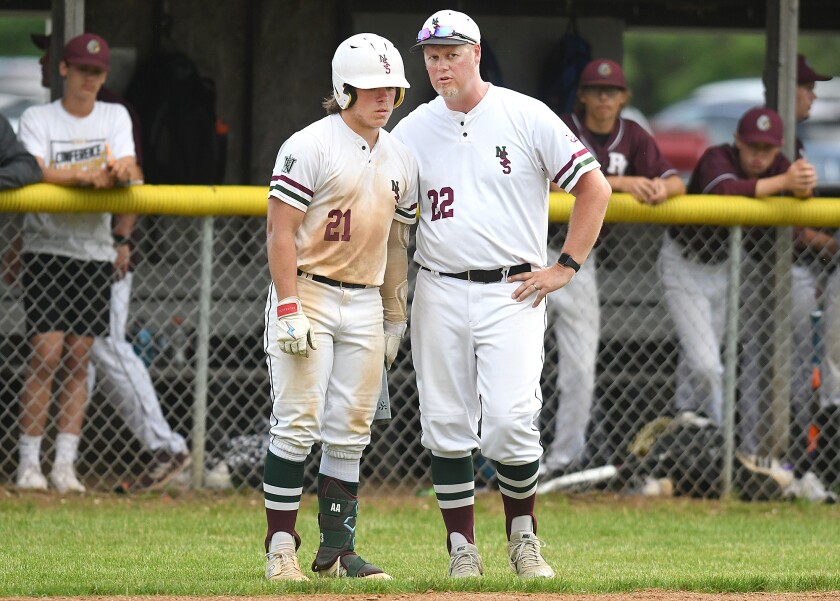 Coach talks to player.