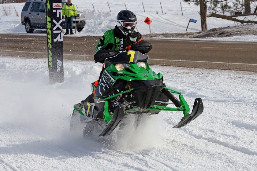 Snowmobilers race