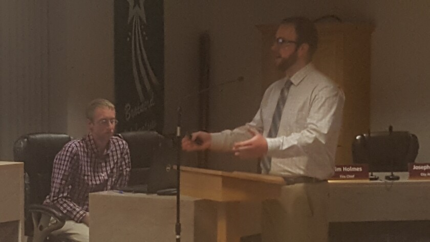 City Engineer Paul Sandy (right) presents outlines of the five-year capital improvement plan, a citywide initiative to repair or replace the city's infrastructure in the coming years. Assistant City Engineer James Fladung looks on. Gabriel Lagarde / Brainerd Dispatch