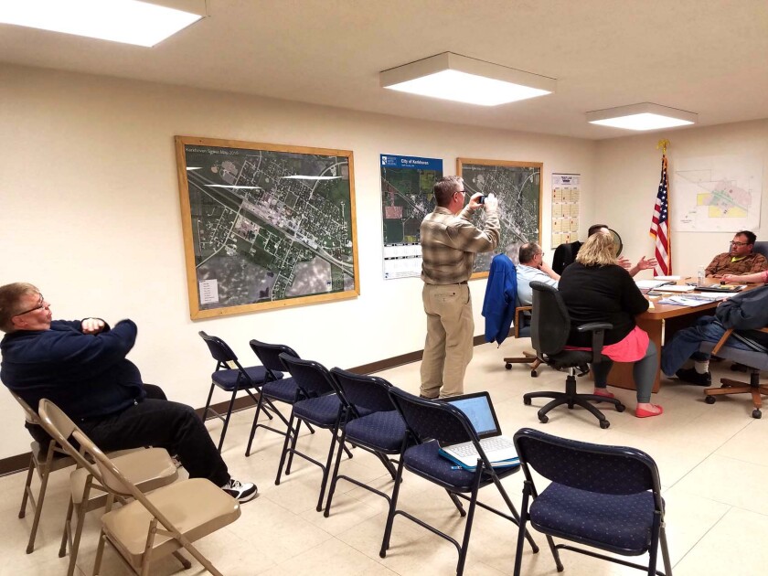 James Rothers is pictured on the far right presiding as mayor over a 2017 Kerkhoven city council meeting where his rezoning request and tower were debated.