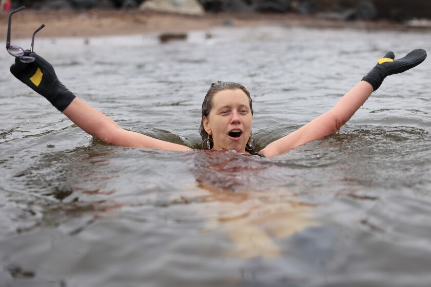 people swim in cold water in December