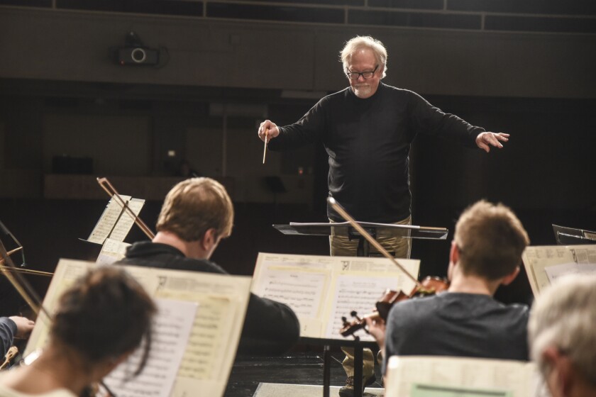 Erica Dischino / TribuneStephen Ramsey conducts the symphony orchestra during a dress rehearsal Tuesday for the Willmar Area Symphonic Concert scheduled Sunday at the Willmar Education and Arts Center.
