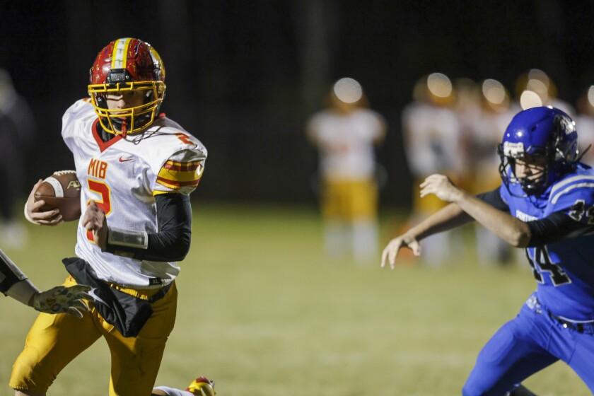 high school boys playing football