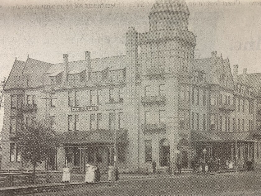 People walk outside the Villard Hotel in early Brainerd.