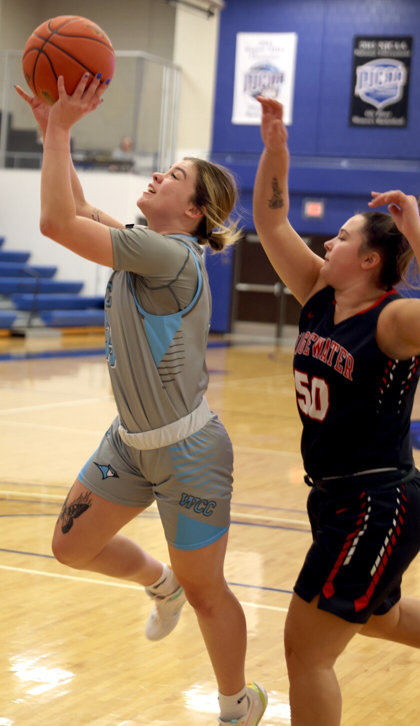 Minnesota West Community and Technical College's Lady Jays Dannyn Peterson (33) does a layup during a game against the Ridgewater Warriors.
