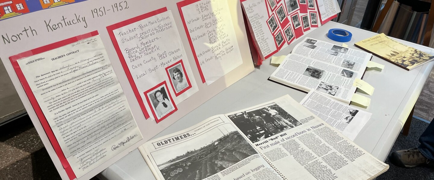 Information in the form of written words about rural schools in Cass County is on display on a table outside the CTC Center auditorium in Pillager during the Thursday, July 28, 2022, panel discussion about education.