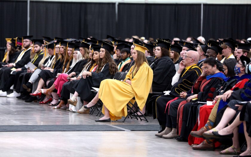 Graduates sitting at a ceremony