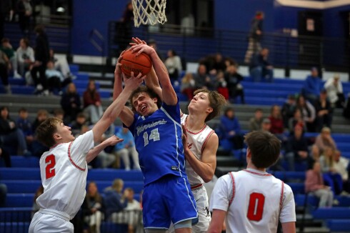 Brainerd's Eli Tautges gets the rebound against Duluth East Greyhounds on Thursday, Jan. 23, 2025, in Brainerd.