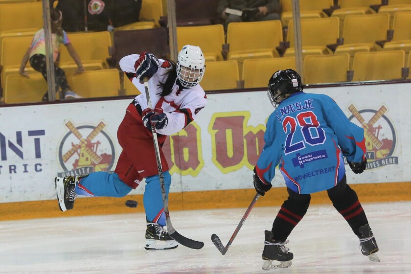 Duluth Icebreakers play hockey against a team from Oslo, Norway.