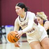 college athletes play basketball