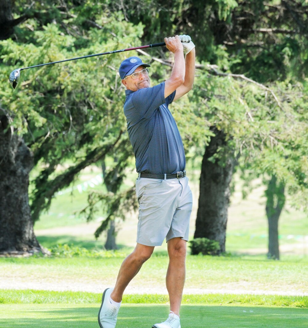 Steve Herzog launches a drive down the No. 6 fairway on Aug. 5,