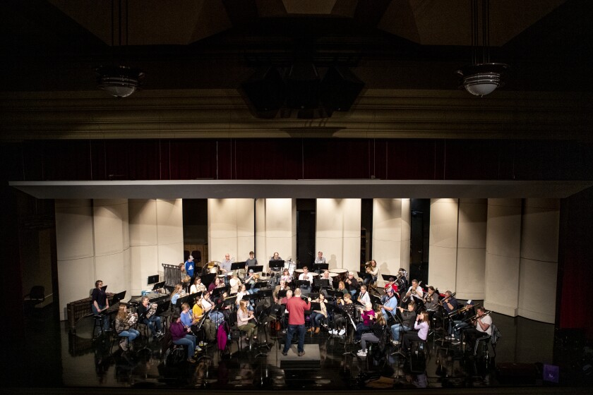 The Prairie Winds Concert Band practices during a rehearsal session at the Willmar Education and Arts Center Monday, April 18, 2022, for their upcoming show, "Music in Color."