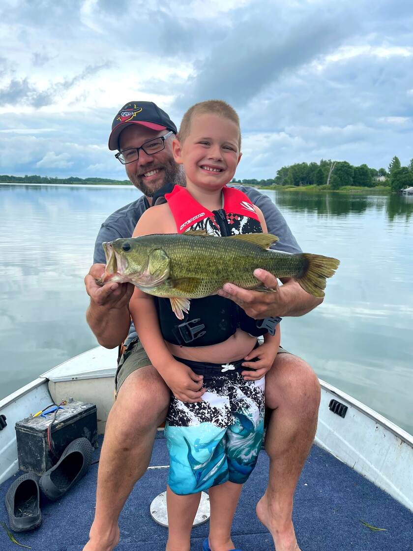 090421.O.GFH.DIYGUY-Miller and son with bass.jpg