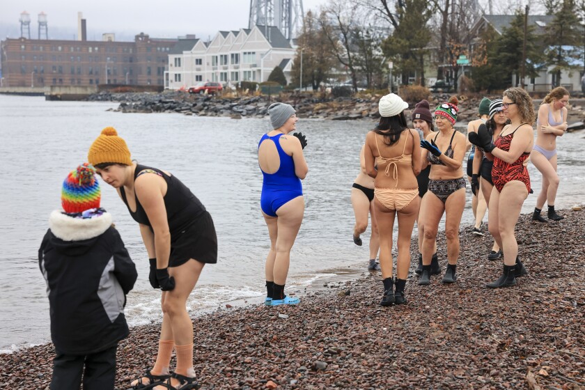 people swim in cold water in December