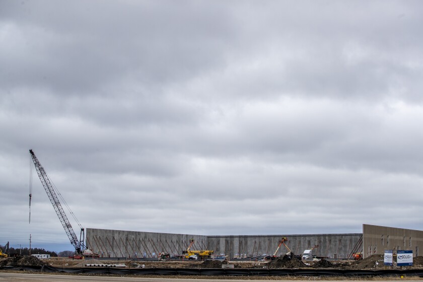 The first three walls of the 217,000-square-foot FedEx distribution center, located between Willmar and Trott Avenues Southwest along Kandiyohi County Road 5, have started going up Wednesday, March 23, 2022.