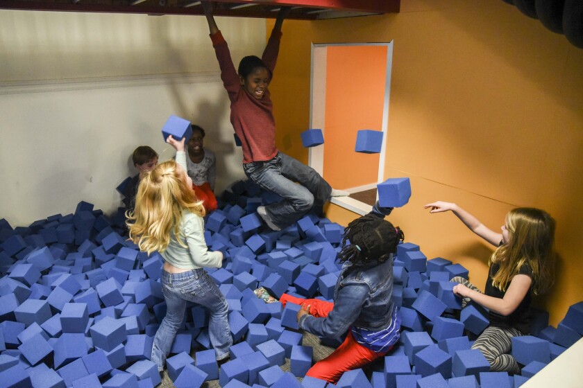Erica Dischino / TribuneChildren play Jan. 22 in the foam pit at The Village Children’s Museum in Willmar. The museum, located on Lakeland Drive, is set to open Monday, and has several play structures including a slide and tunnels.