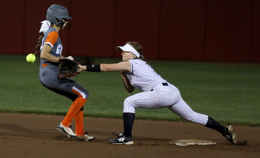 Superior’s Ari Robillard (3) fields a throw to second base to pick off Kaukauna’s Kally Meredith (17)