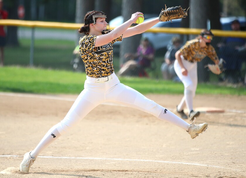 Pitcher winds up.