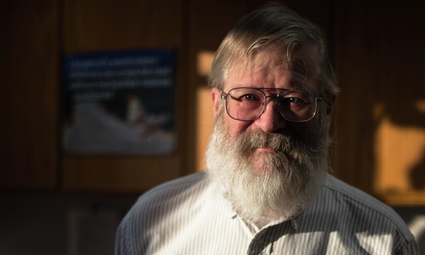 Mike Gaffey, professor of Space Studies poses for a portrait in his office in Grand Forks, ND on Wednesday, December 21, 2016. (Joshua Komer / Grand Forks Herald)