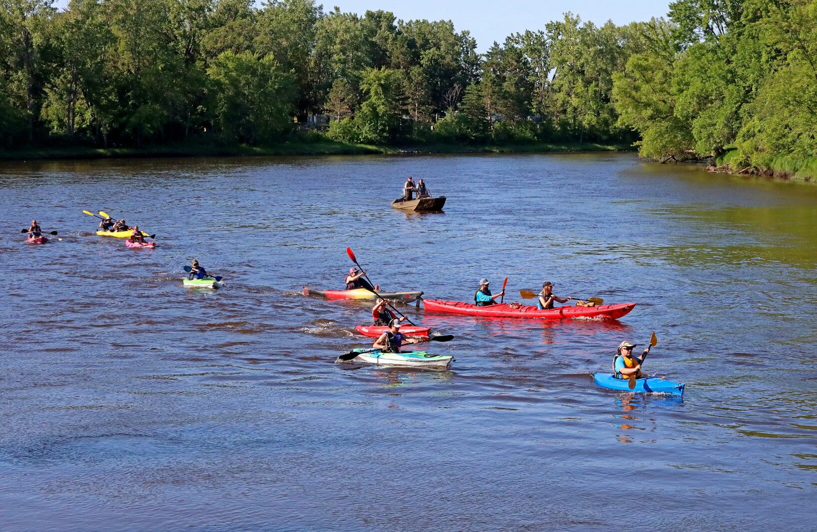 Racers head up the Mississippi River on Saturday, July 30, 2022, going from Kiwanis Park to Evergreen Landing and back again in Brainerd.
