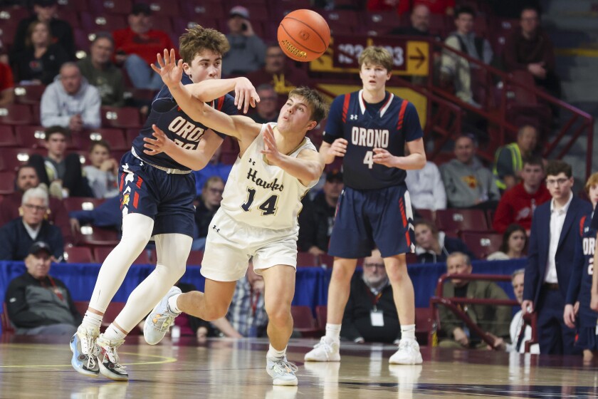 high school boys play basketball