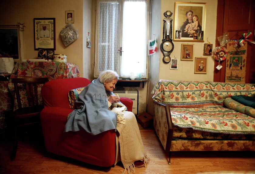 Emma Morano, thought to be the world's oldest person and the last to be born in the 1800s, is seen during her 117th birthday in her house in Verbania, northern Italy, Nov. 29, 2016. REUTERS/Alessandro Garofalo