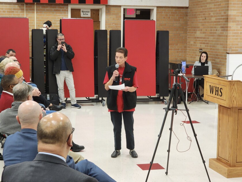 Retiree Deb Meyer, a registered nurse at the hospital in Worthington for 44 years, speaks about the importance of putting patients first, and expresses concerns about losing local services to relocations, as the hospital's Behavioral Health Unit was shuttered.