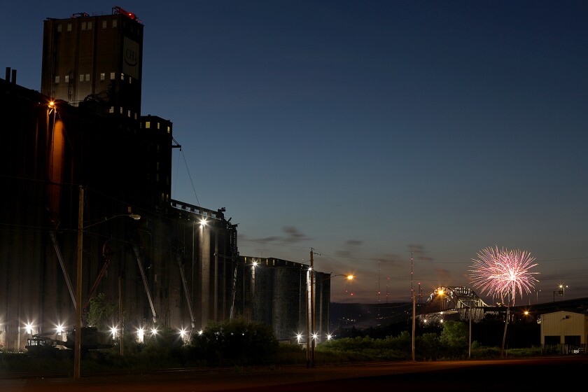 Fireworks from Duluth’s Fourth Fest light up the sky over the Blatnik Bridge