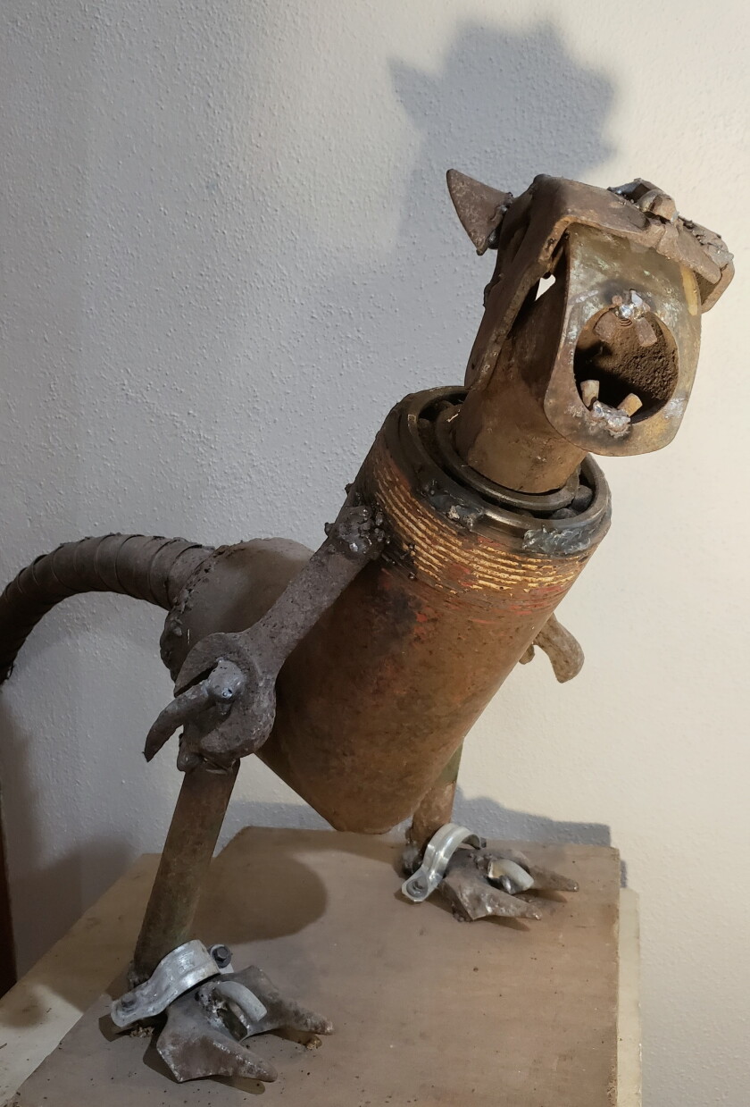 Landon Amberg created this dinosaur from scrap parts. The jaw and tail move. It is on display at the Bird Island Cultural Centre June 1 - June 26 as part of the exhibit featuring the work of Pat Amberg and sons, Jason and Landon.