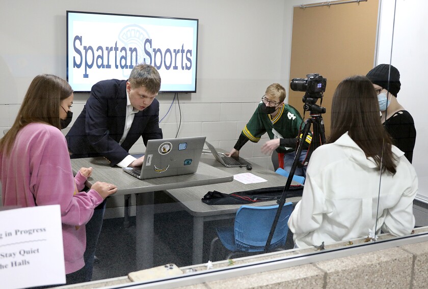 Left to right, Tatum Williams, Jack Curtis, Dale Summerfield Jr., Cassie Aiken and Xalia Raabel work on the Spartan Spin Weekly