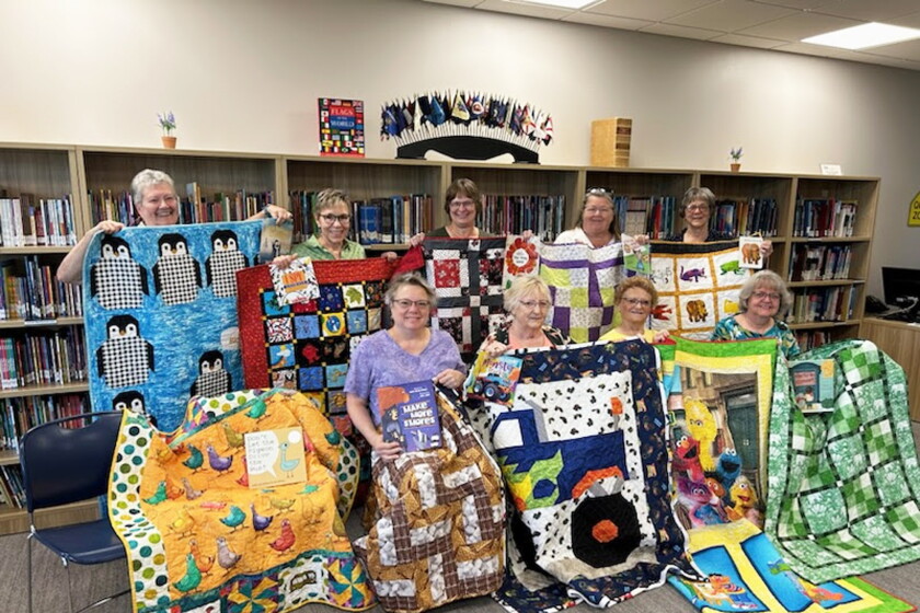 Communication Quilt Jamestown Quilters Guild donates quilts to children at Anne Carlsen ...