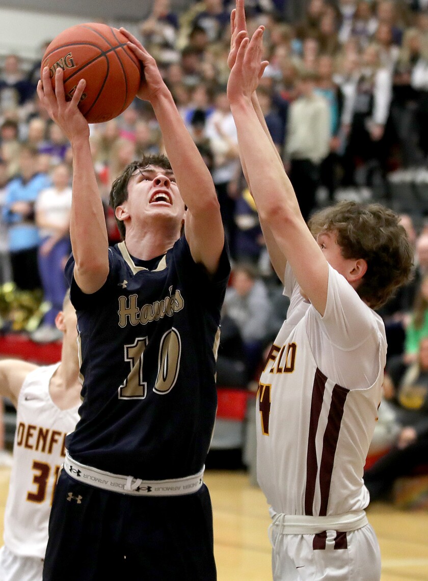 Player in blue takes a shot.