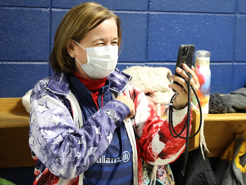 Jackie Shuster takes a video of her grandsons Luke and Logan Shuster